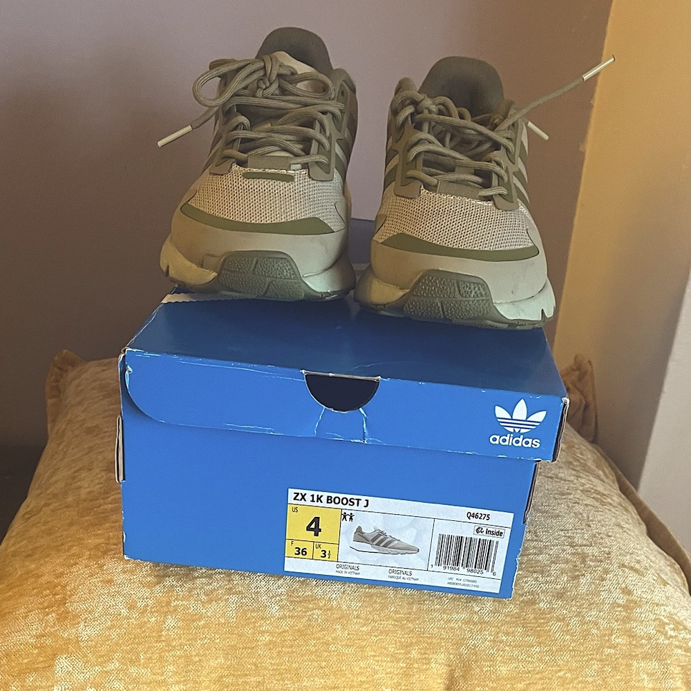 Addias big kid sneaker in good condition only wore once.